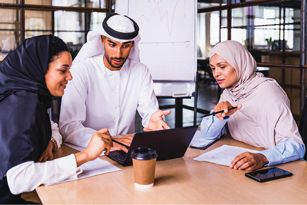 Multiethnic corporate business team meeting in the office for a strategic marketing plan - Office workers, entrepreneurs and company employee at work in a multinational company