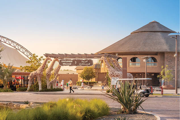 23 February 2021, Dubai, UAE: Visitors and tourists with families and children enter the gates of the Explorer Village at Dubai Zoo