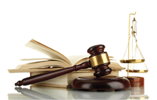 Golden scales of justice, gavel and books isolated on white