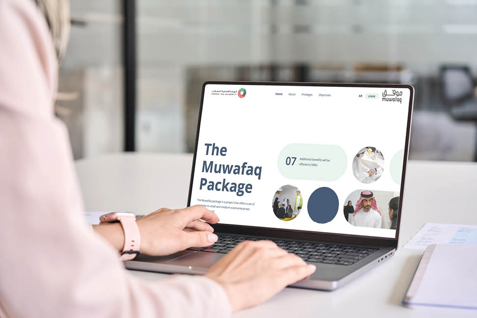 Business woman worker or student elearning looking at white mock up blank screen using laptop computer learning online, remote working, searching on web. Website mockup display template. Over shoulder