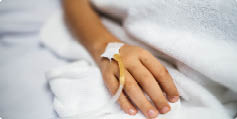 Closeup of hand with IV tube